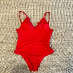 Red Stella McCartney one piece suit